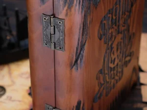 Dice Box Relic – handcrafted wooden dice storage with engraved fantasy emblem